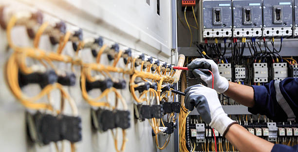 Professional Electrician technician working in Sacred Heart University, CT
